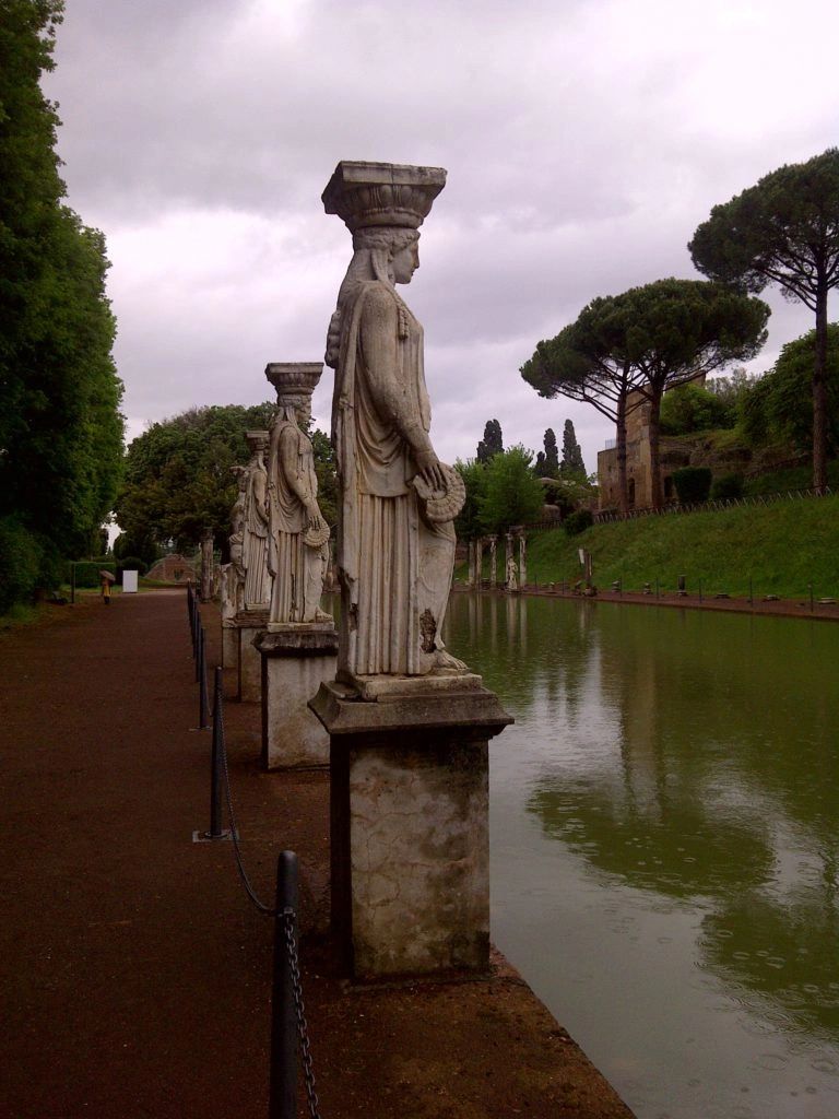 Roman statue garden with classical sculptures